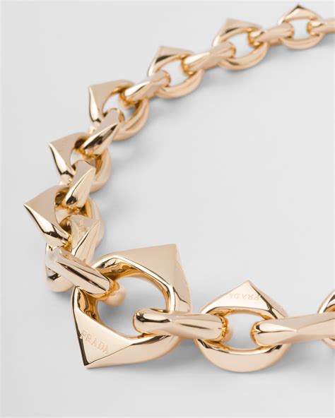 prada necklace triangle gold.